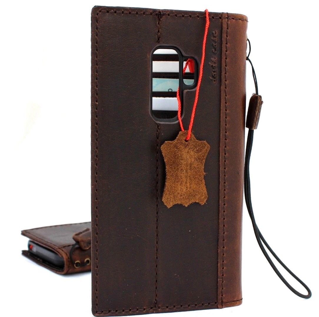 Handmade vintage leather Galaxy S9 Plus wallet case with card slots, embossing, and compatibility with wireless charging.