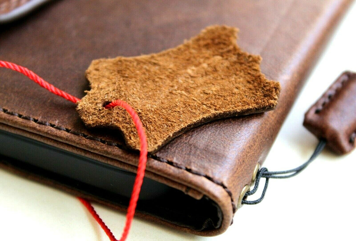 Genuine dark leather iPhone 12 Pro case by DAVISCASE with vintage-style book wallet design, credit card slots, soft closure.