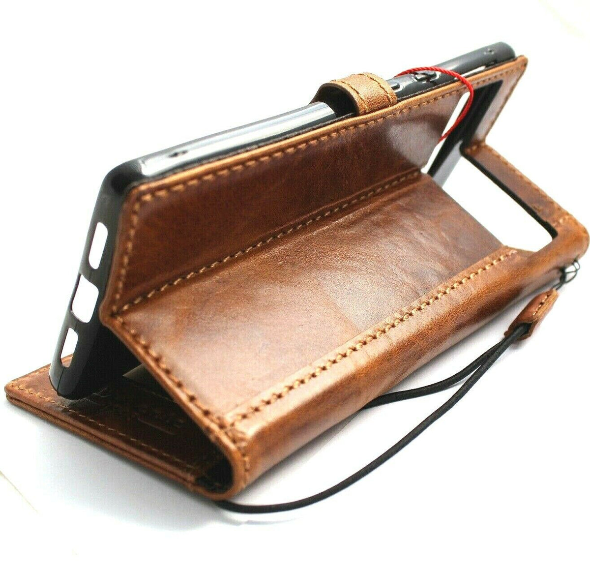 Genuine leather wallet case for Google Pixel 7 Pro by DAVISCASE, with magnetic closure, stand feature, retro tan finish, wireless charging compatible