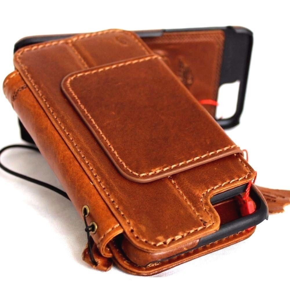 Genuine full leather iPhone 8 case with wallet design, card slots, magnetic closure, and detachable cover in a classic art style.
