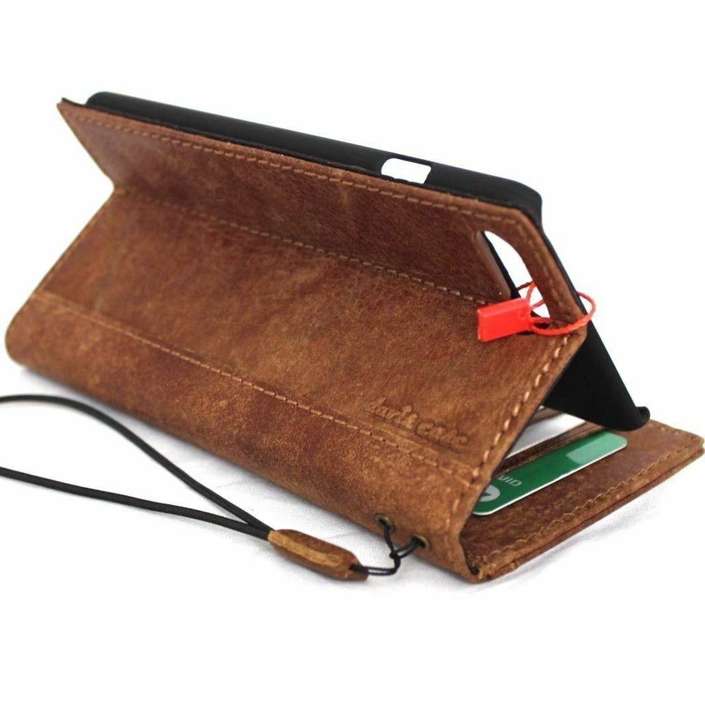 Genuine bright brown soft leather iPhone SE 2 case with wallet card slots, slim design, and soft cover for wireless charging.