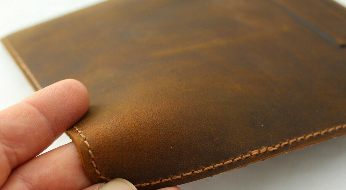 Handmade genuine leather iPad case by DAVISCASE with vintage soft leather design and handcrafted luxury craftsmanship.