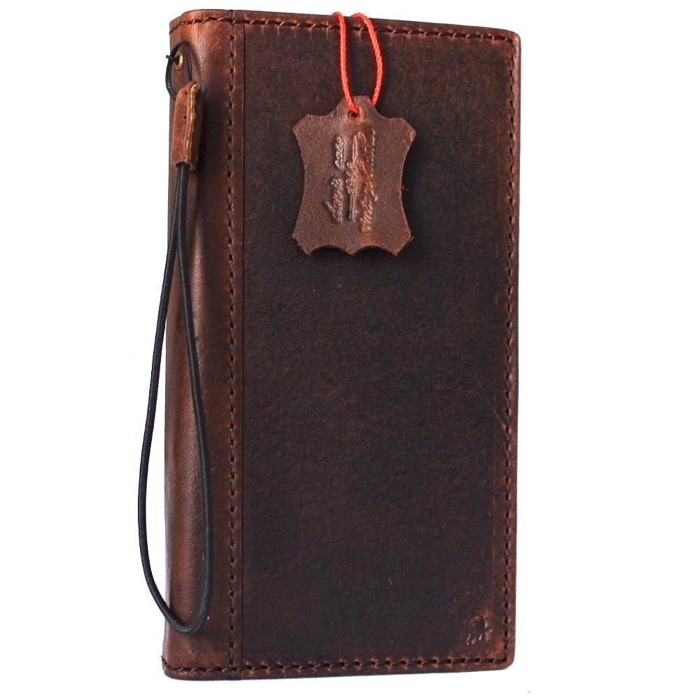 Handmade genuine leather Samsung Galaxy S8 Active wallet case with magnetic clasp and card slots, featuring a sleek book-style design.