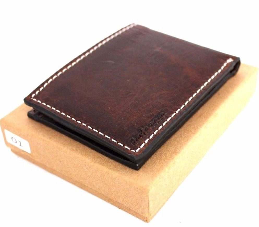 Men's brown leather wallet with four credit card slots and one bill compartment, slim bifold design, vendor-unknown brand.