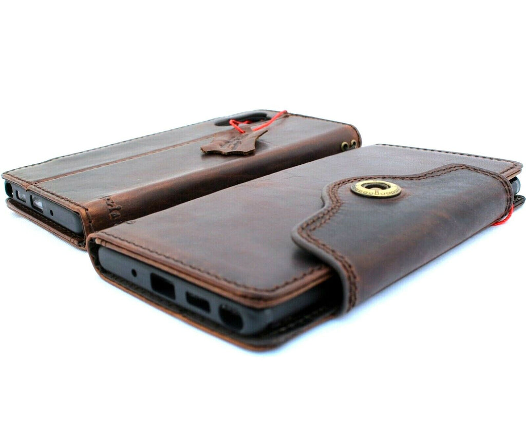 Handmade genuine leather phone case for Samsung Galaxy models, featuring wallet clasp and precise cutouts for S24, S25, Note, A series.