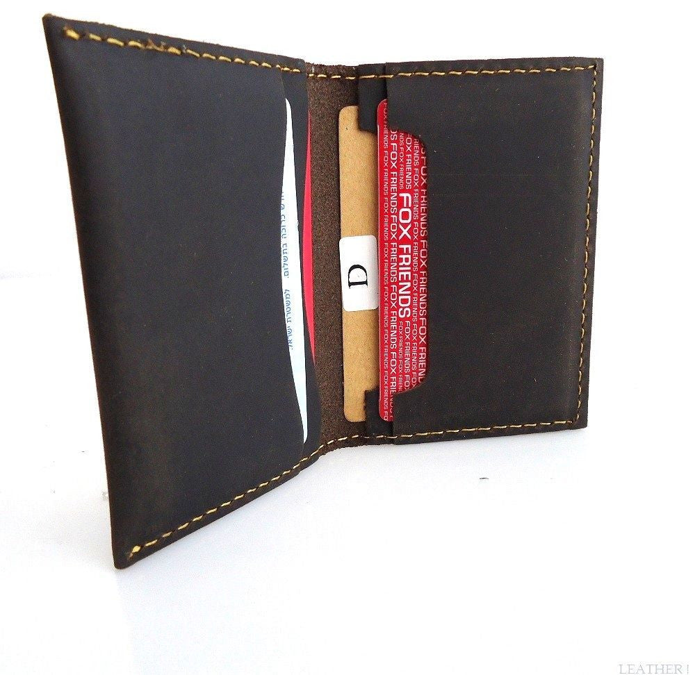 Men's brown leather bifold card case with 4 card slots and 2 slip pockets, slim and compact for back pocket use.
