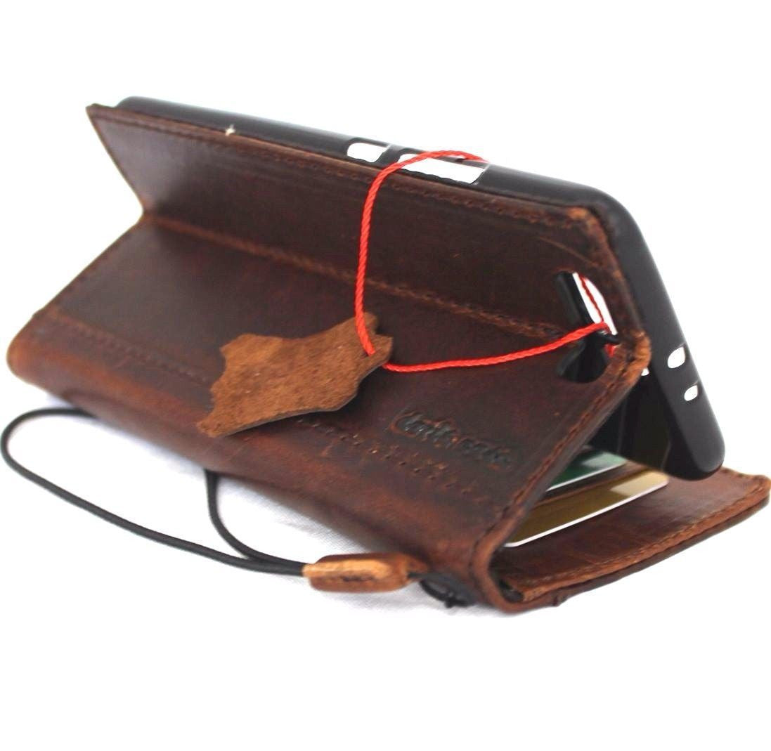 Handmade genuine leather wallet case for Huawei P10 Plus, featuring retro brown design, card slots, slim fit, and craftsmanship.