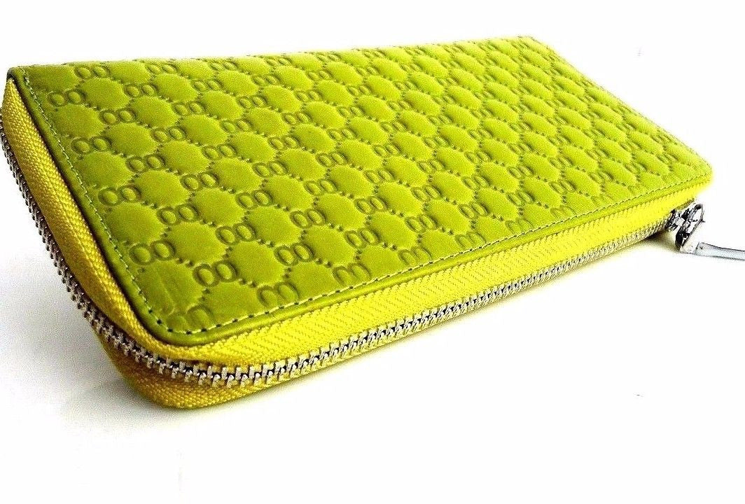 Green genuine leather women's purse and clutch by DAVISCASE, featuring a spacious tote and coin wallet with elegant design.