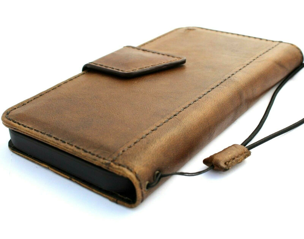 Handmade DAVISCASE leather phone case for iPhone 15/14 Pro Max, vintage style with credit card slots and magnetic closure.
