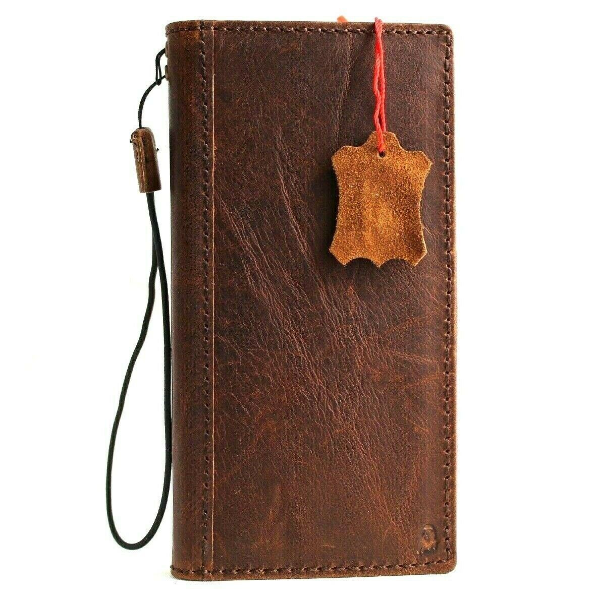 Dark leather Galaxy S22 Plus 5G case by DavisCase with ID window, card slots, wireless charging, rubber top grain finish.