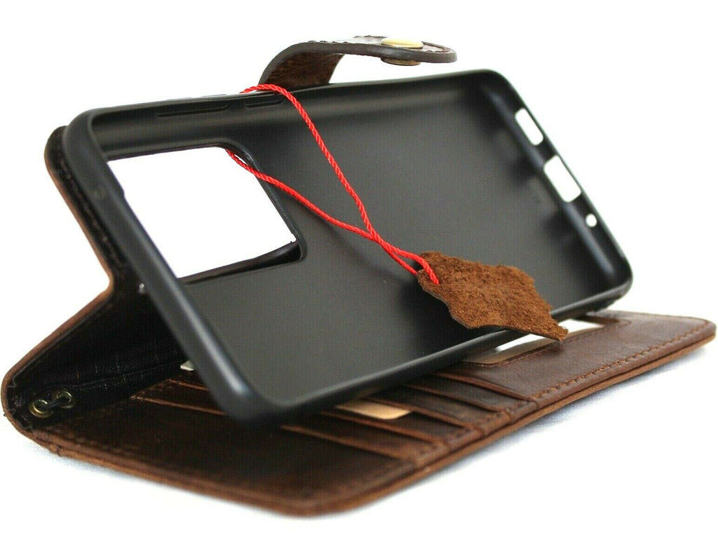 Dark brown genuine top grain leather Samsung Galaxy S20 Ultra wallet case with handmade craftsmanship and rubber holder for wireless charging.