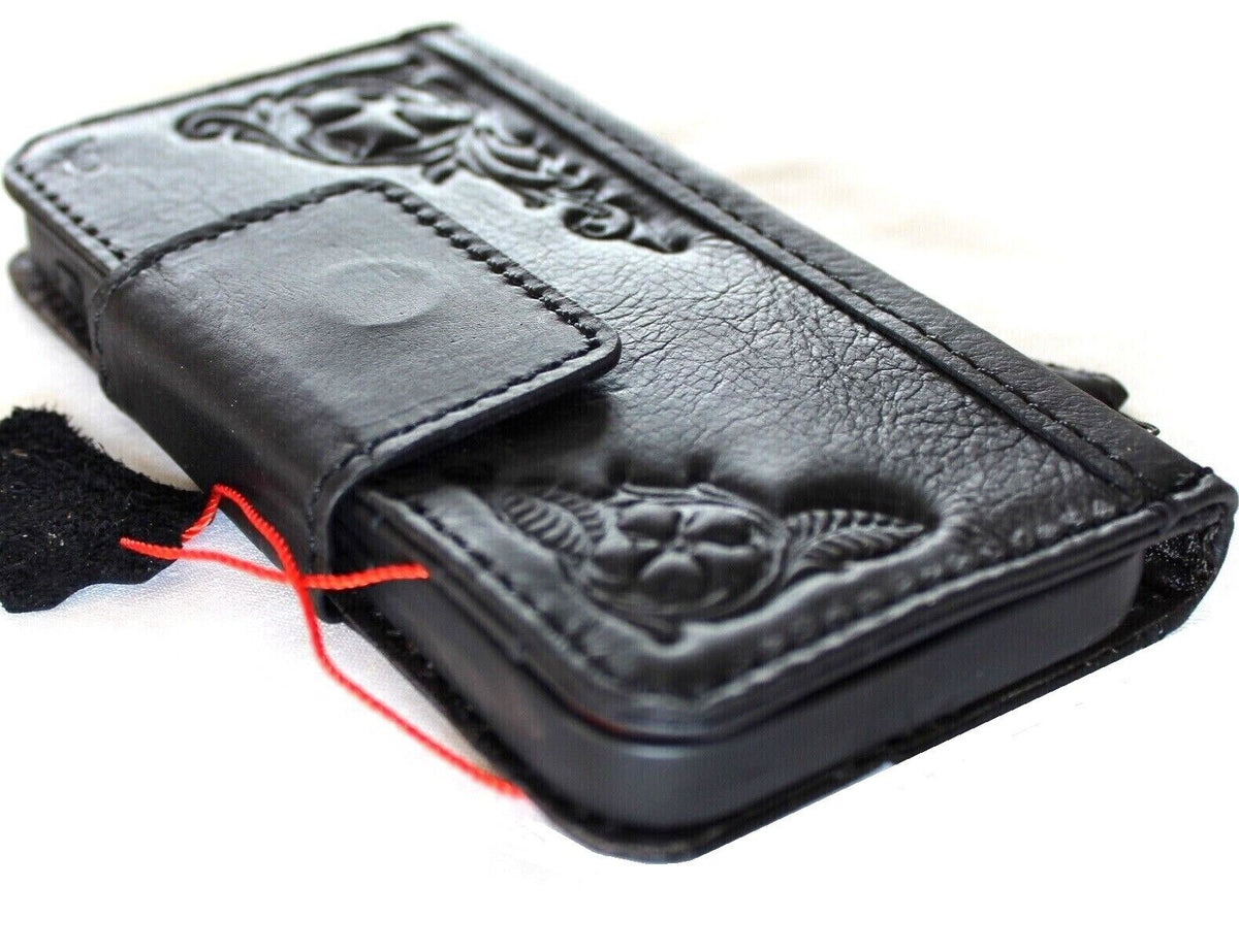 Black genuine leather Google Pixel 7 Pro case with magnetic closure, wallet design, embedding decorations, and stand feature.