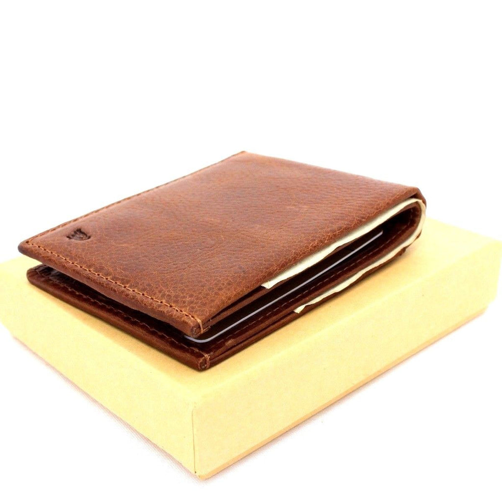 Handmade genuine leather men's wallet with custom stamped design, slim style, featuring credit card slots and personalized details.