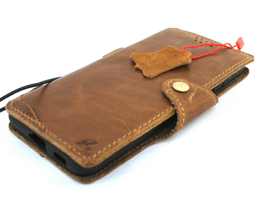 Handmade tan leather wallet case for Samsung Galaxy S21 with slim design, rubber holder, and wireless charging compatibility.
