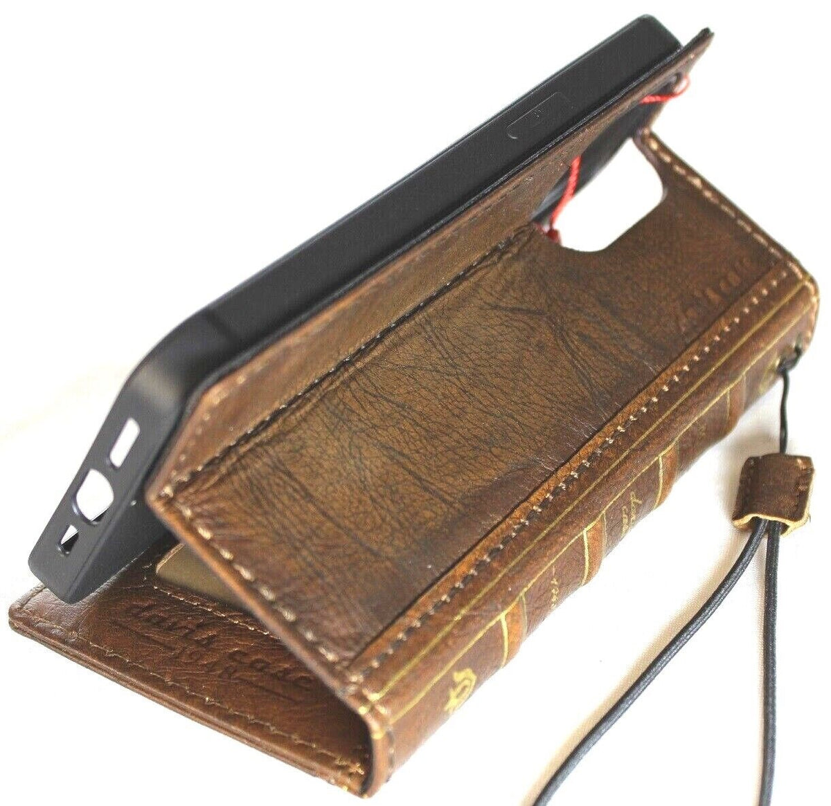 Handmade genuine leather phone case by DAVISCASE for iPhone models, featuring a sleek, textured finish and card slots.