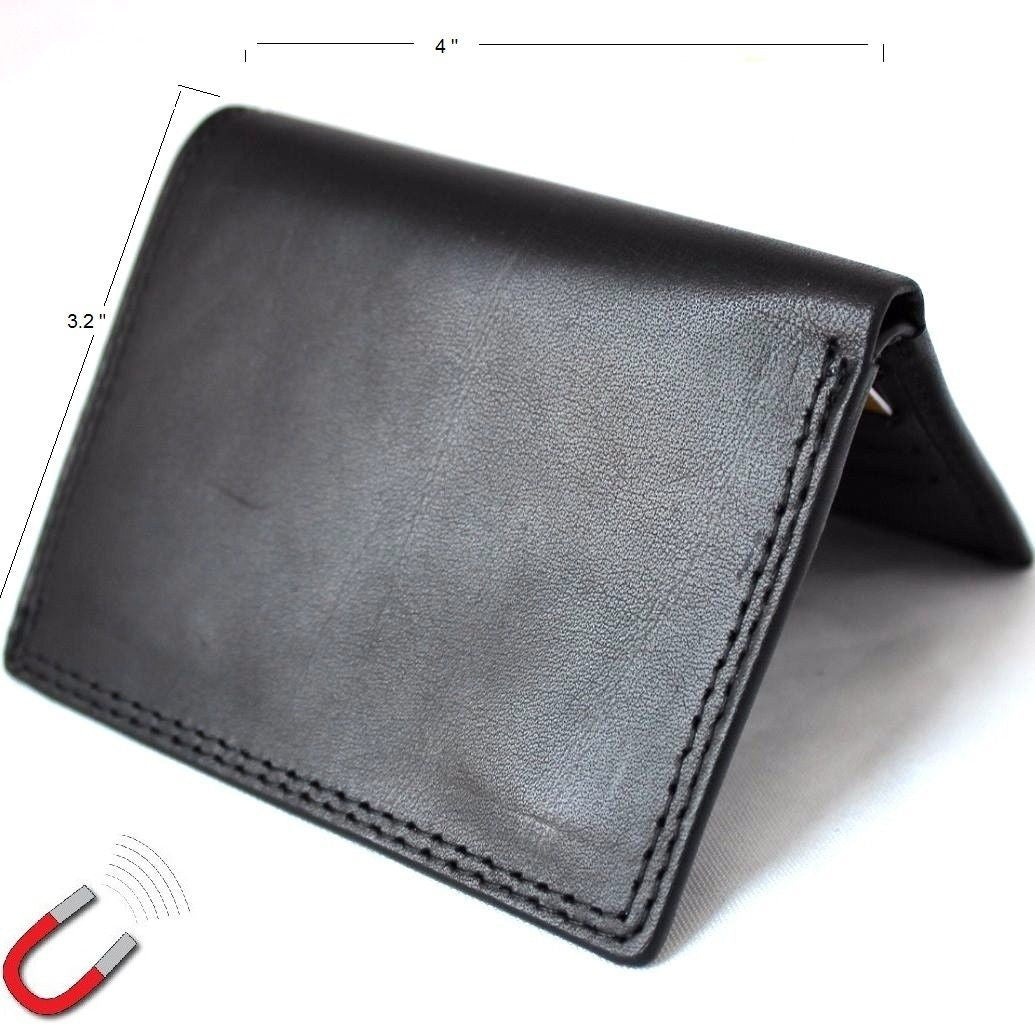 Men's black genuine leather mini wallet with card slots, zipper coin pocket, magnetic closure, soft texture, slim design.