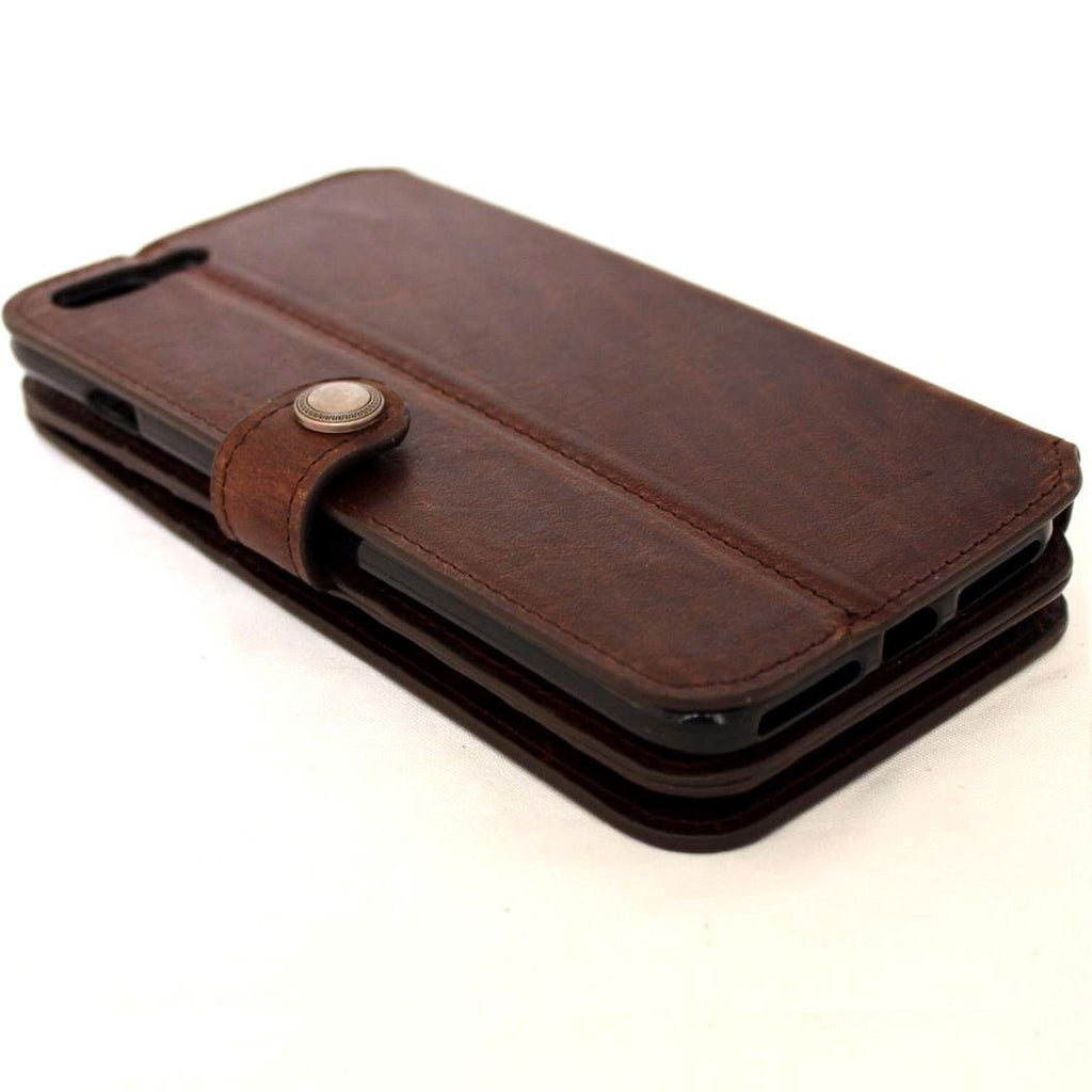 Brown genuine leather iPhone 8 case with wallet design, card slots, RFID protection, and book closure for luxury protection.