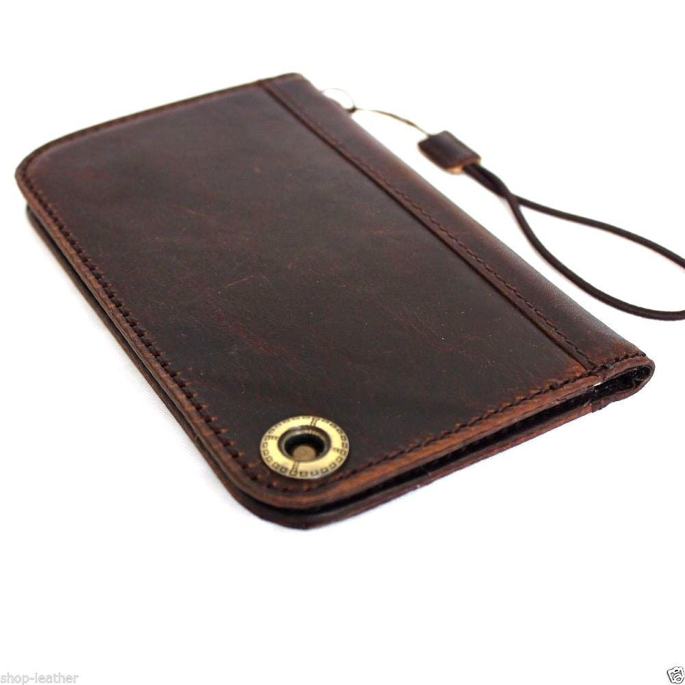 Handcrafted dark Italian leather wallet case for iPhone 8, slim design with book-style cover, by vendor-unknown.
