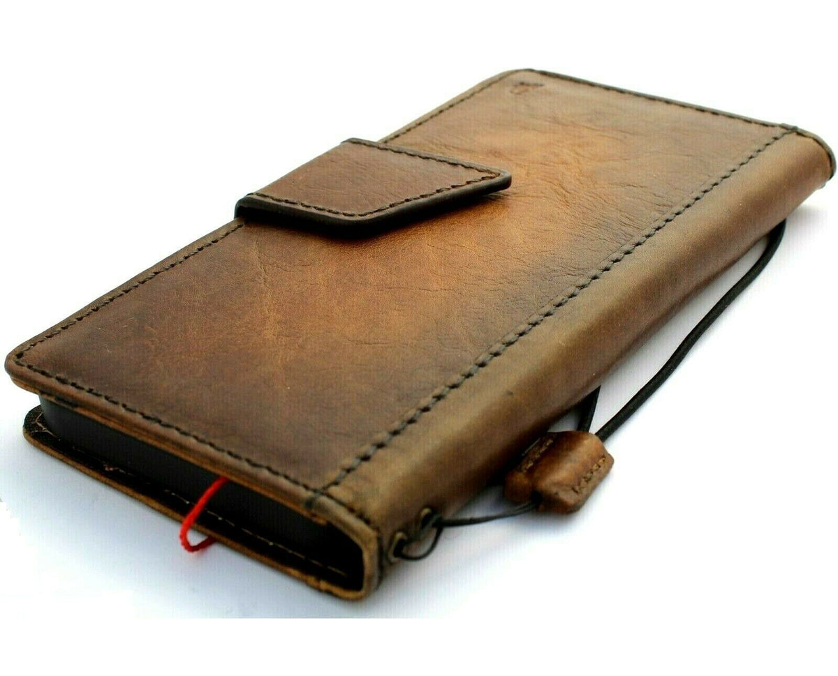 DavisCase genuine leather phone case for iPhone 13 and 12 with vintage-style wallet design, credit card slots, and magnetic closure