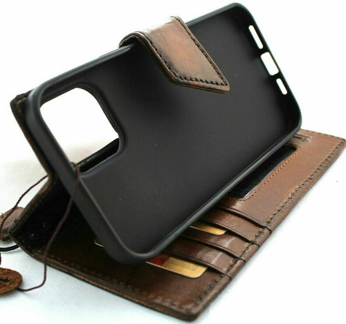 Genuine dark leather wallet case for Apple iPhone 11 Pro by DAVISCASE with vintage look, credit card slots, and magnetic closure.