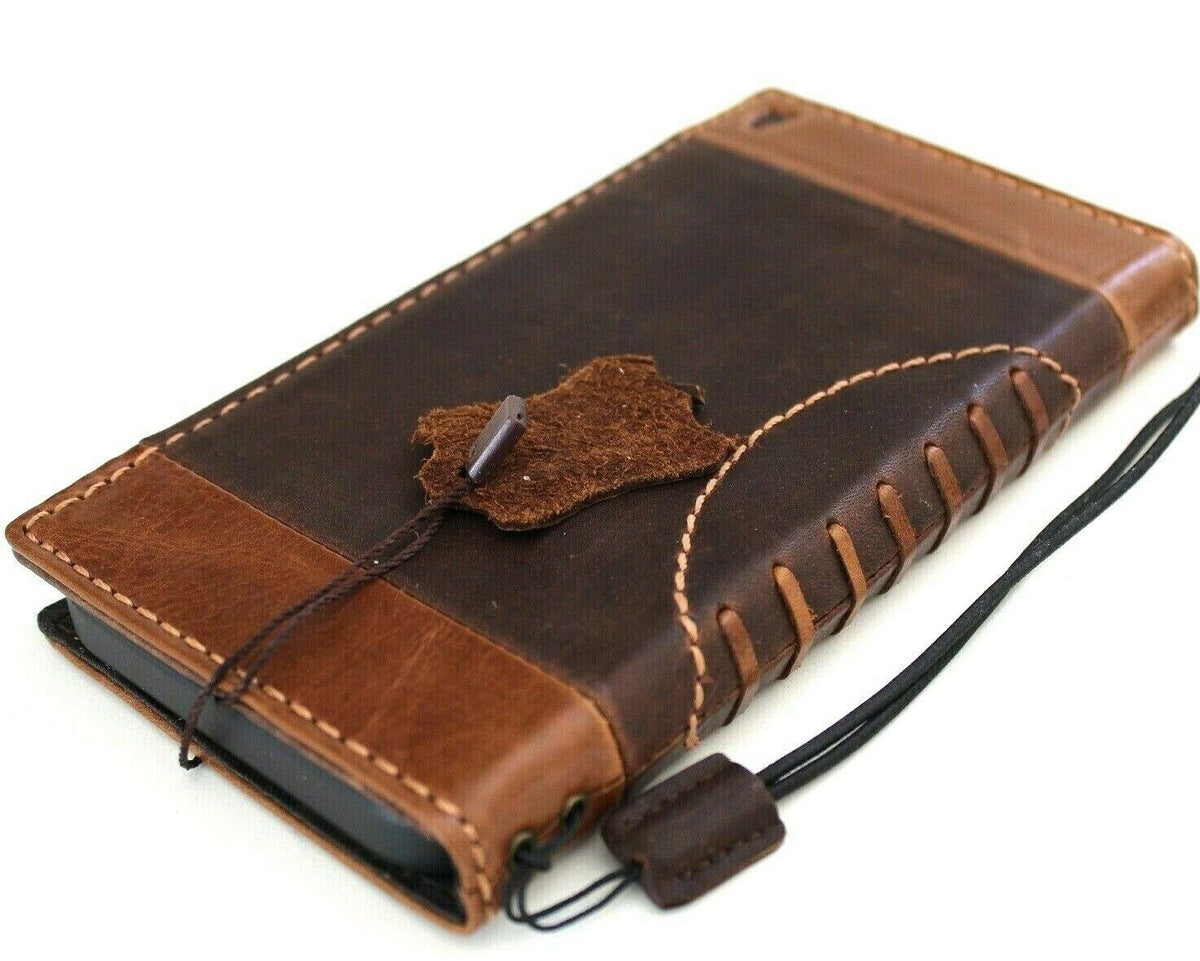 Handmade genuine leather wallet case for Apple iPhone 11 Pro Max by DAVISCASE, with credit card slots and wireless charging capability.