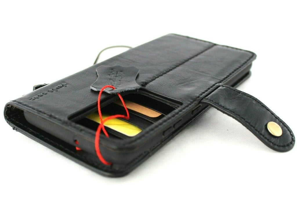 Handmade genuine top grain leather case for Samsung Galaxy S21 Ultra 5G with built-in wallet and credit card slots, black rubber holder.
