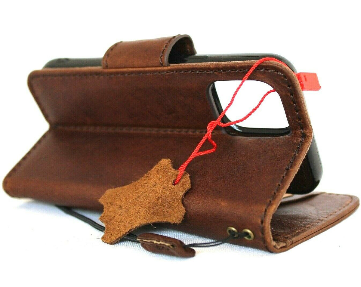 Genuine dark leather iPhone 12 Mini case by DAVISCASE with vintage book wallet design, credit card slots, soft closure, and magnetic cover.