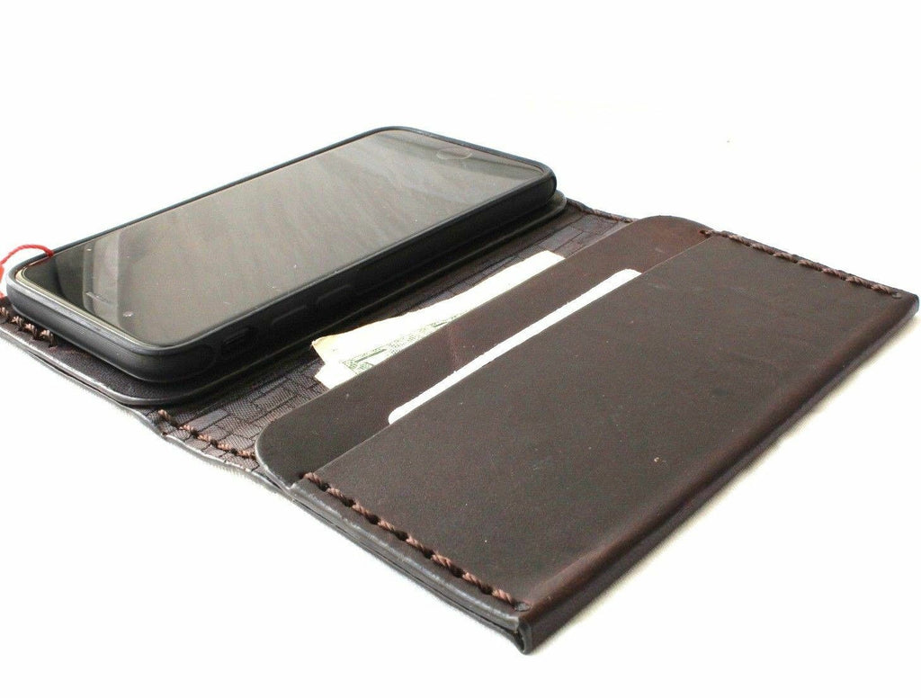 DavisCase genuine dark leather iPhone 8 slim case with vintage book wallet design, soft interior, and wireless charging compatibility.