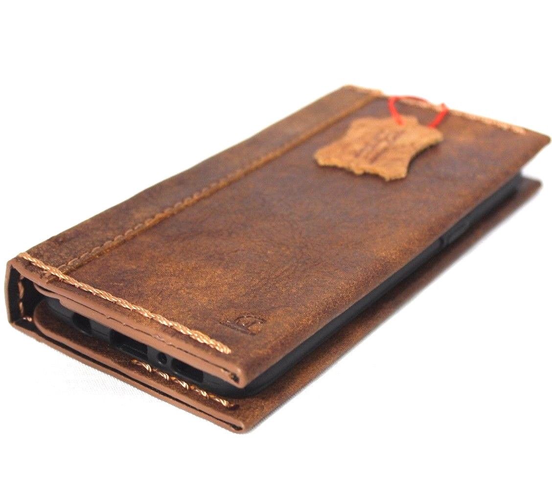 Soft brown handmade leather wallet case for Samsung Galaxy S8 Plus with card slots, featuring a sleek book design.