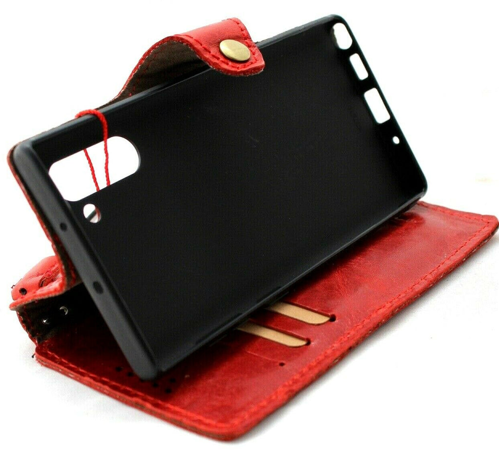 Red genuine leather flip wallet case for Samsung Galaxy Note 10 by DAVISCASE, showcasing a slim design with strap and handcrafted detail.