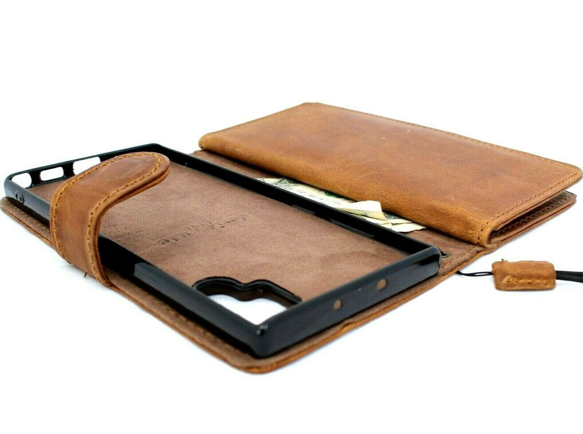 Genuine full leather Samsung Galaxy Note 10 Plus wallet case with removable slots, magnetic closure, and rubber window feature.