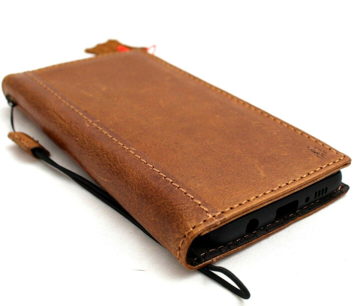 Genuine tan leather galaxy S10e Daviscase wallet cover with card slots, strap, and charging port opening.