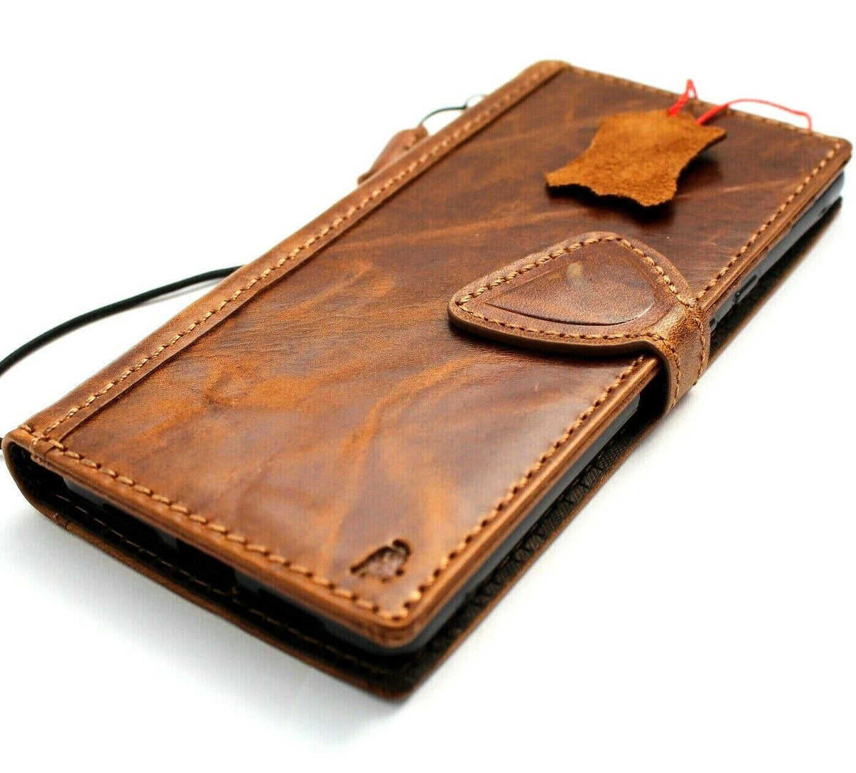 Genuine leather Google Pixel 7 Pro case by DAVISCASE with wallet design, magnetic closure, stand feature, retro tan finish.