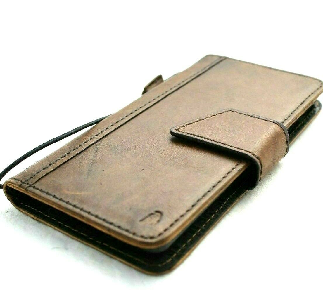 Genuine leather Google Pixel 7 Pro case by DAVISCASE with magnetic closure, wallet design, retro stand, dark brown color.