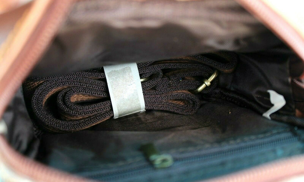 Men's vintage brown Daviscase leather waist pouch with crossbody strap, full grain leather, luxury style, and adjustable belt.