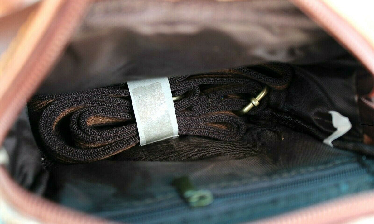 Men's vintage brown Daviscase leather waist pouch with crossbody strap, full grain leather, luxury style, and adjustable belt.