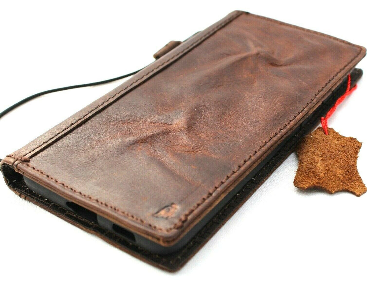 Genuine dark vintage leather wallet case for Samsung Galaxy S21 Plus 5G by DAVISCASE with ID window, card slots, and wireless charging.