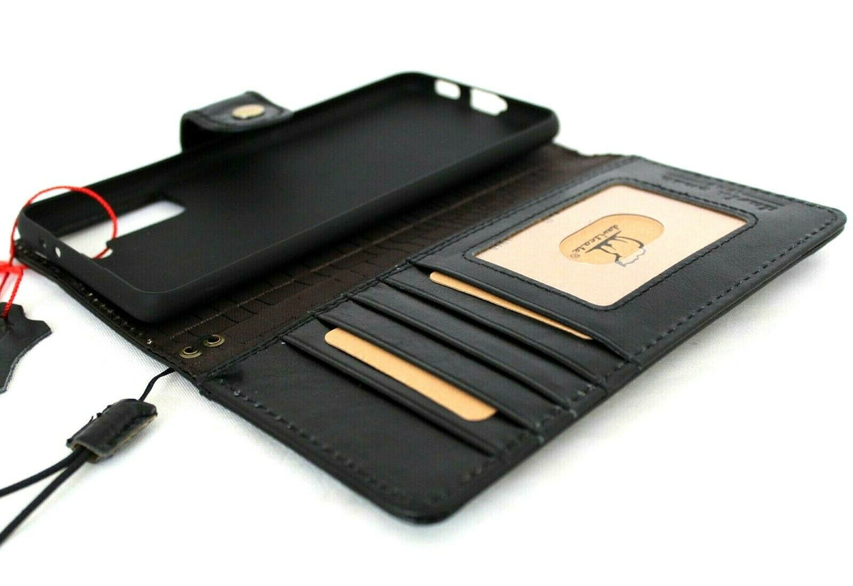 Black leather Samsung Galaxy S22 Plus 5G wallet case with card slots, ID window, and wireless charging holder by DAVISCASE.