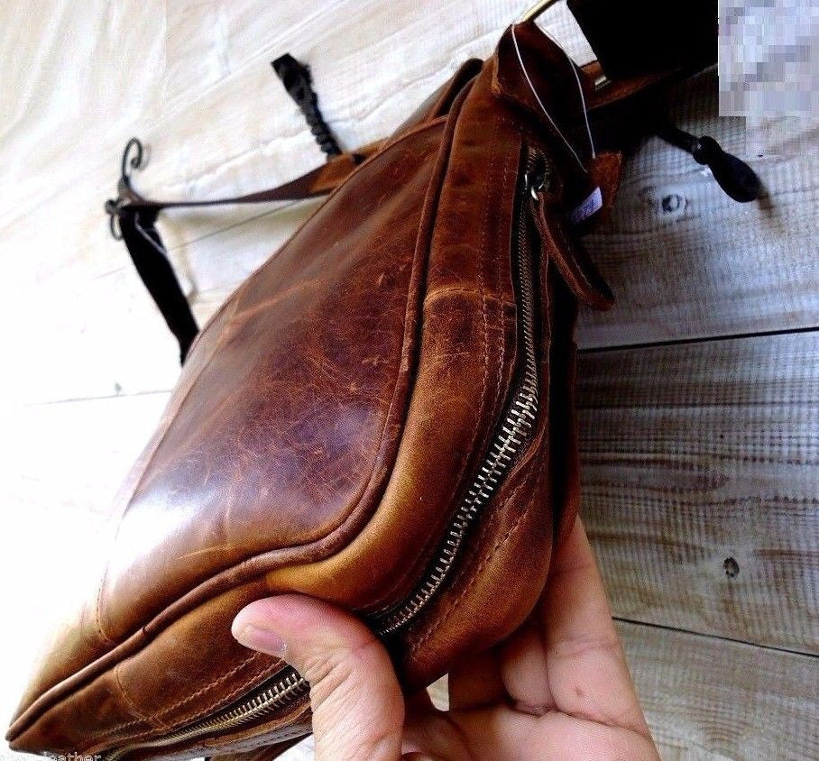 Genuine buffalo leather men's shoulder bag with vintage crossbody design, suitable for tablets and iPads, in classic style.