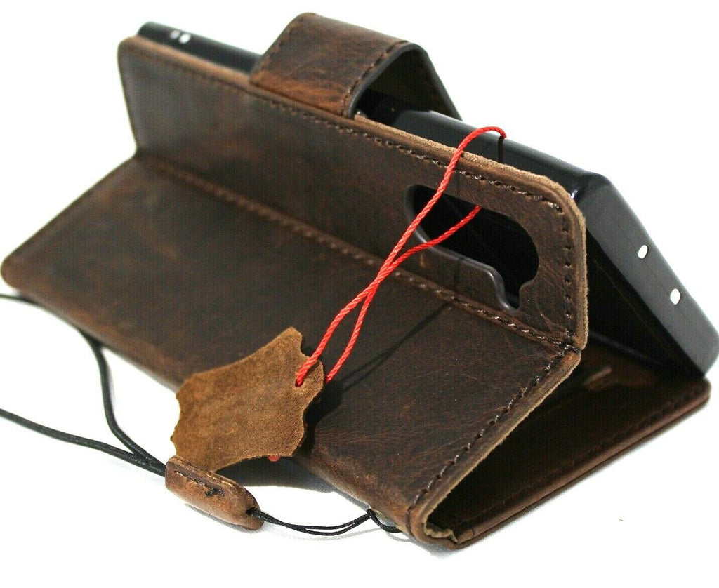 Handmade genuine full dark leather Galaxy Note 10 case with wallet-style design, window, rubber stand, and removable soft interior.