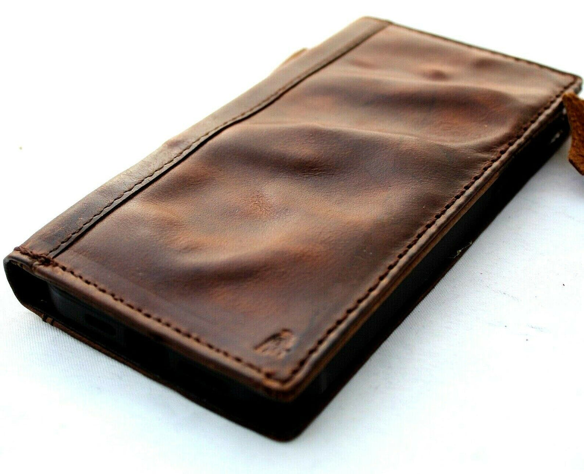 DavisCase vintage leather phone case for iPhone 11-15 and Galaxy S22 Ultra, featuring a wallet book design with a retro, full grain leather look.