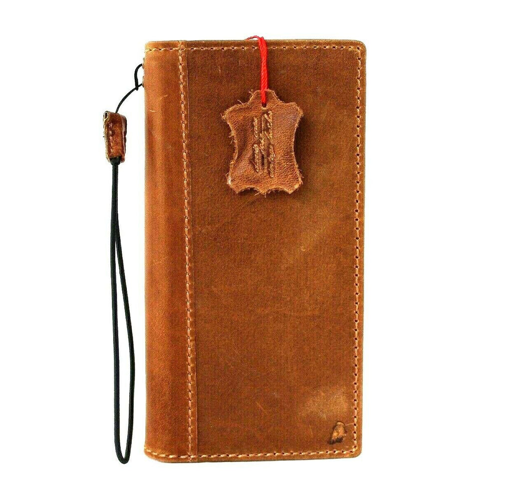 DavisCase genuine leather wallet case for Samsung Galaxy S21 Ultra with card slots, wireless charging holder, and luxury rubber accents.