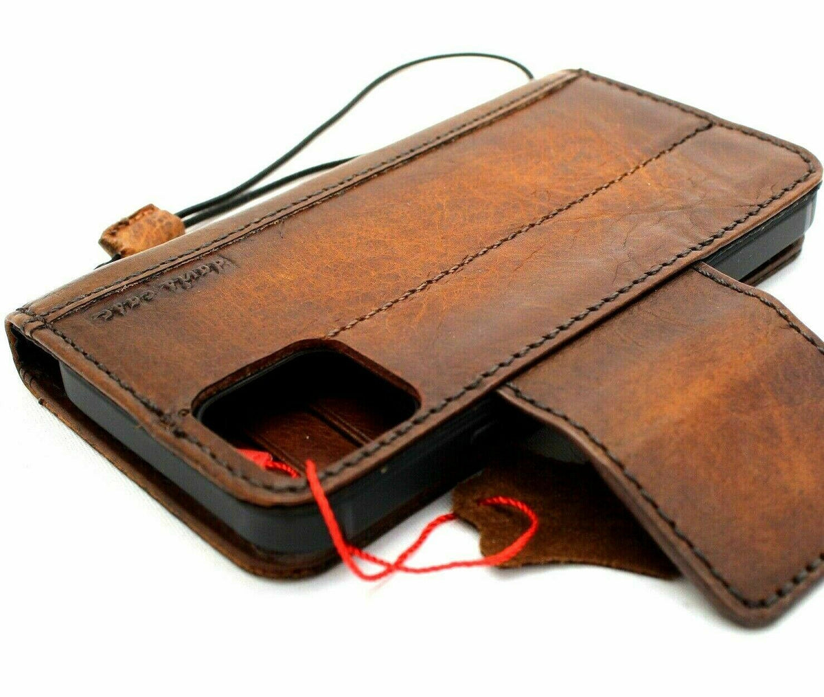 Dark vintage leather phone case for Apple iPhone 12, handmade with credit card slots, soft cover, and magnetic closure by DAVISCASE.