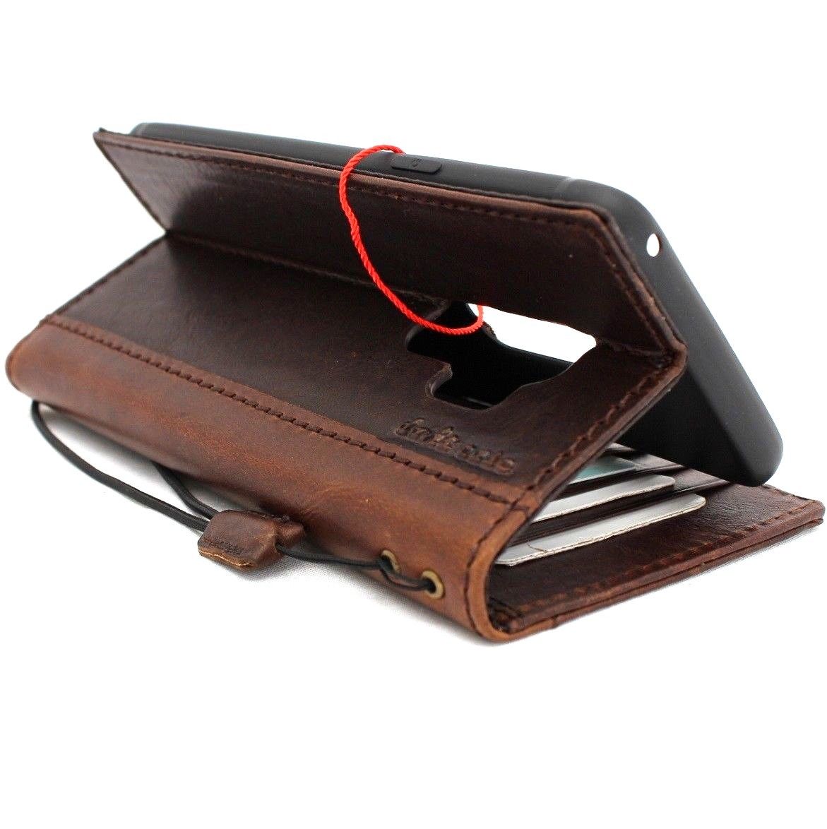 Vintage leather Samsung Galaxy S9 Plus wallet case with card slots, custom embossing, and a handcrafted design for wireless charging.