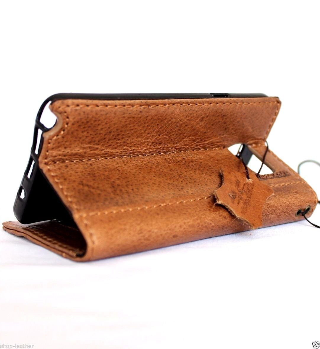 Genuine full leather Samsung Galaxy Note 5 wallet case with book-style design and slim profile for stylish protection.