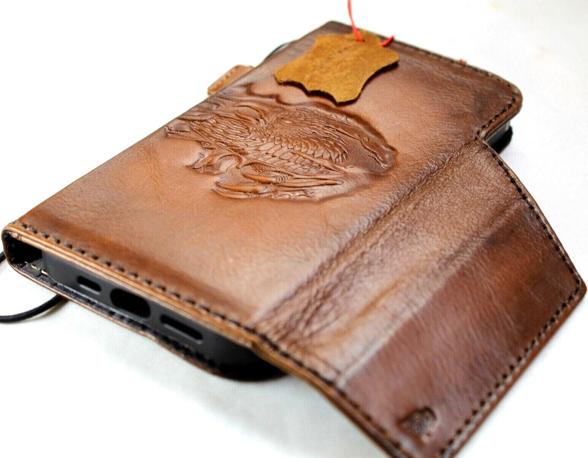 Google Pixel 7 Pro leather case by DAVISCASE with eagle stamping, wallet design, 3D detailing, suitable for wireless charging.