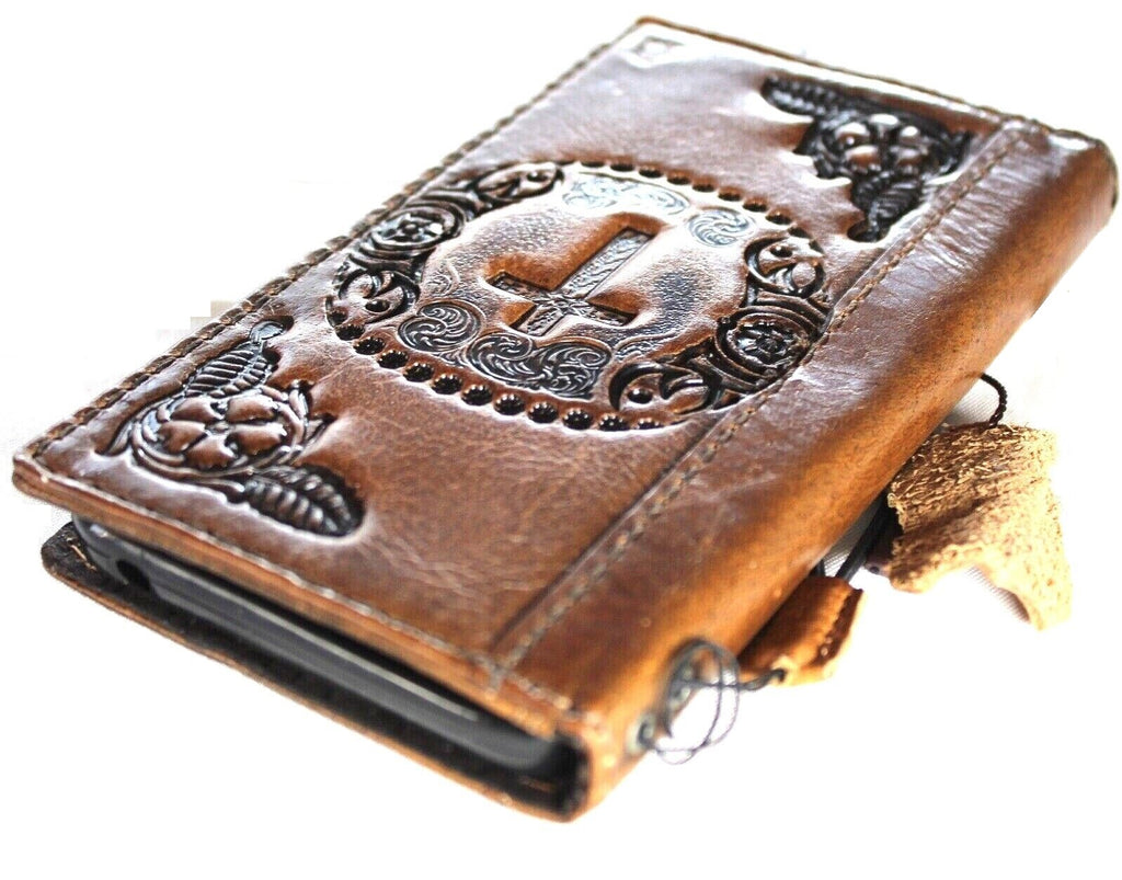 Google Pixel 7 Pro leather case by DAVISCASE, with Jesus cross design, featuring wallet features and wireless charging compatibility.