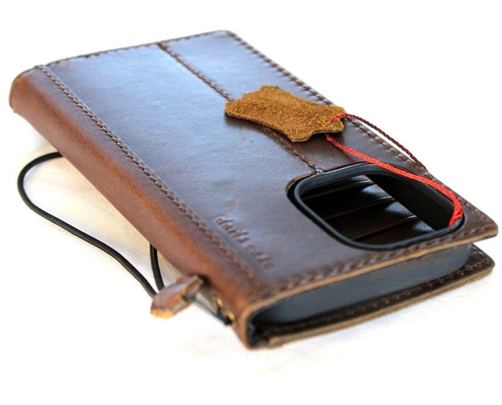 Handcrafted genuine leather phone case for iPhone and Samsung, vintage style with card slots, full grain leather, and artisanal details.
