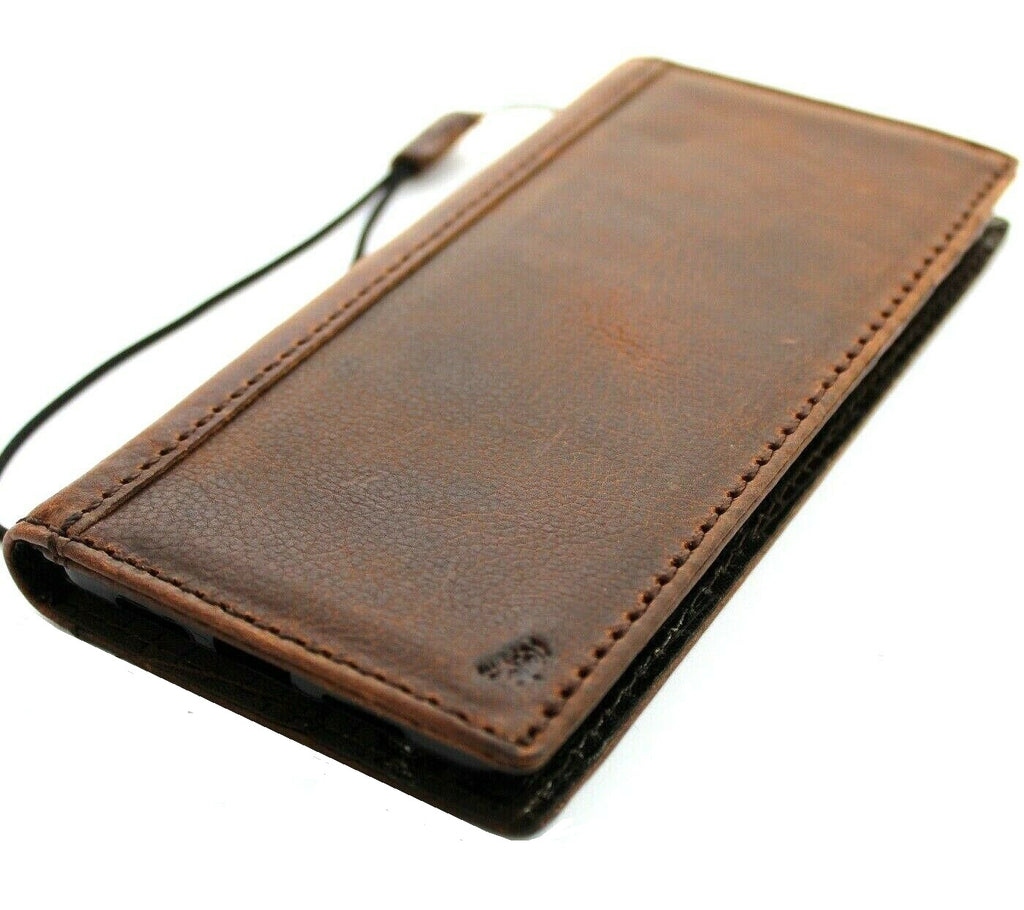 Genuine leather book wallet case for OnePlus 15, 13, 13R, 12, 12R by DAVISCASE, featuring dark retro design and wireless charging support