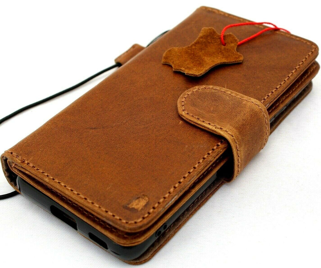 Genuine leather Samsung Galaxy S21 wallet case by DAVISCASE with card slots, window, magnetic closure, slim design, and removable cover.